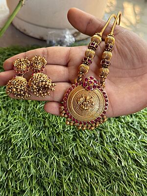 boll with rubi stone neck piece