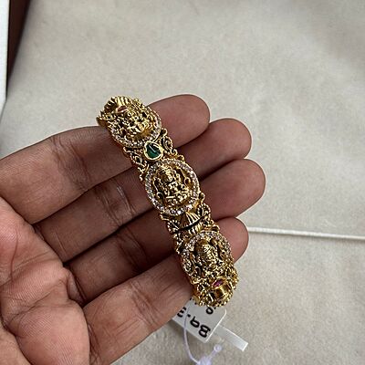 ad stone round design with lakshmi kada bangle