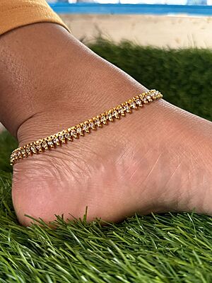 fancy gold ad stone anklets