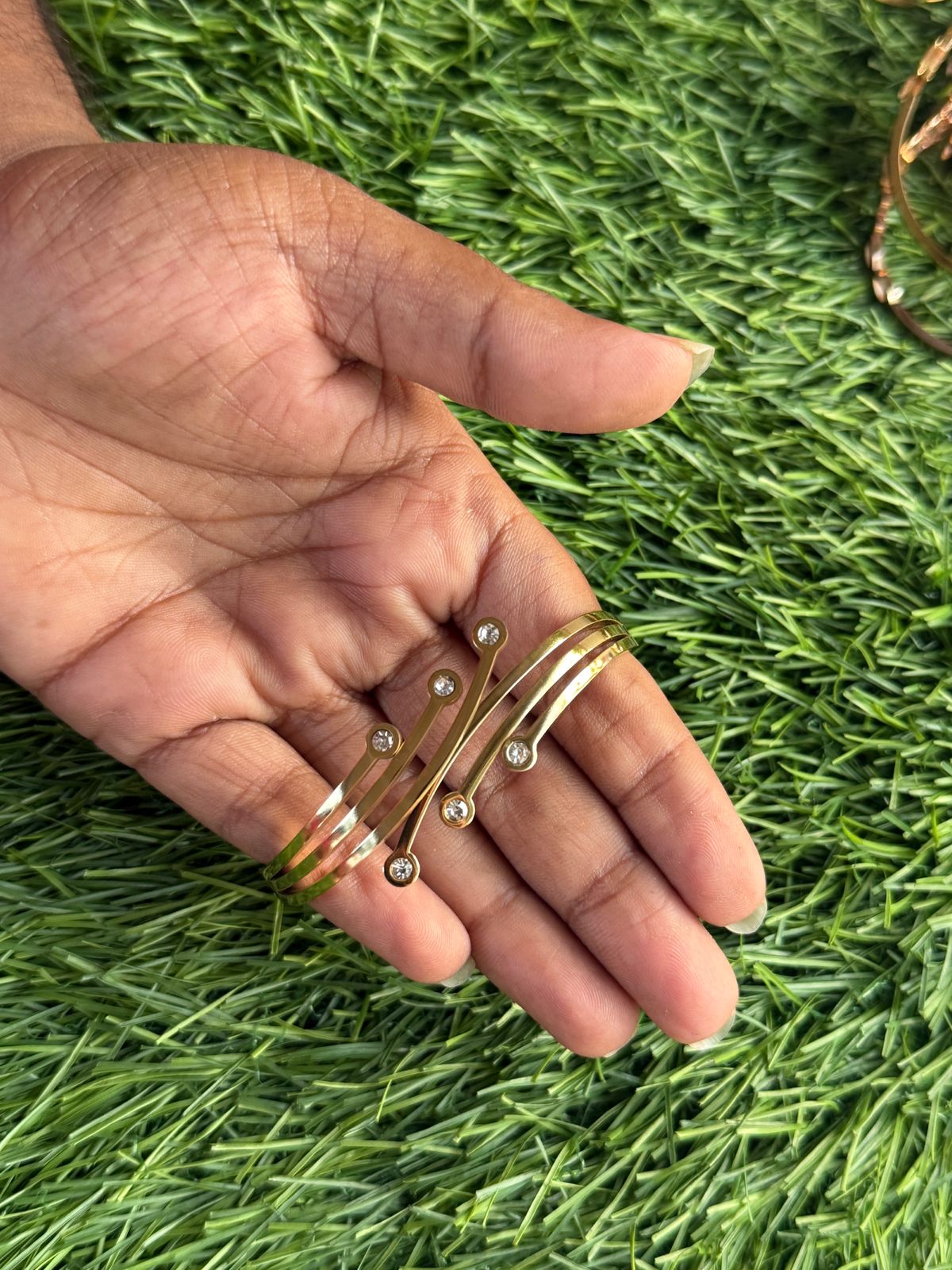 Stone floral design gold plated bracelet