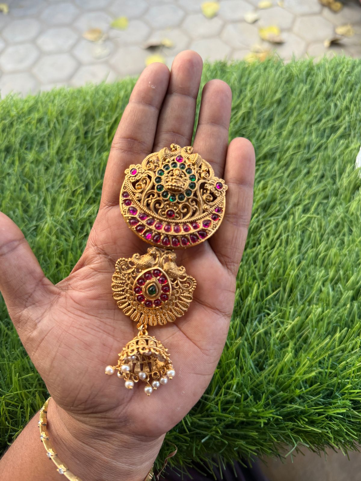 Pretty lakshmi design with green & ruby stone hair accessories