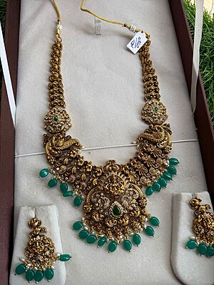 Antic gold finish with unique design with ad stone neckpiece