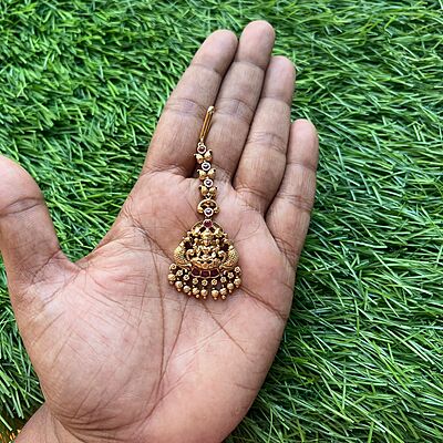 Traditional lakshmi design with multi stone nd gold pearl tikka