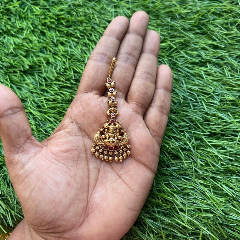 Traditional lakshmi design with multi stone nd gold pearl tikka