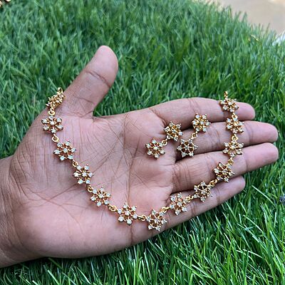Gold Finish multi stone flower neck peace