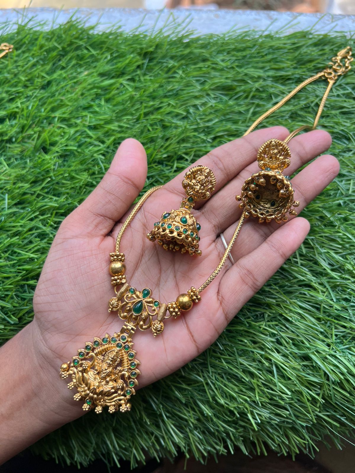 Pink ruby stone with lakshmi dollar gold neckpiece Pink ruby stone with lakshmi dollar gold neckpiece
