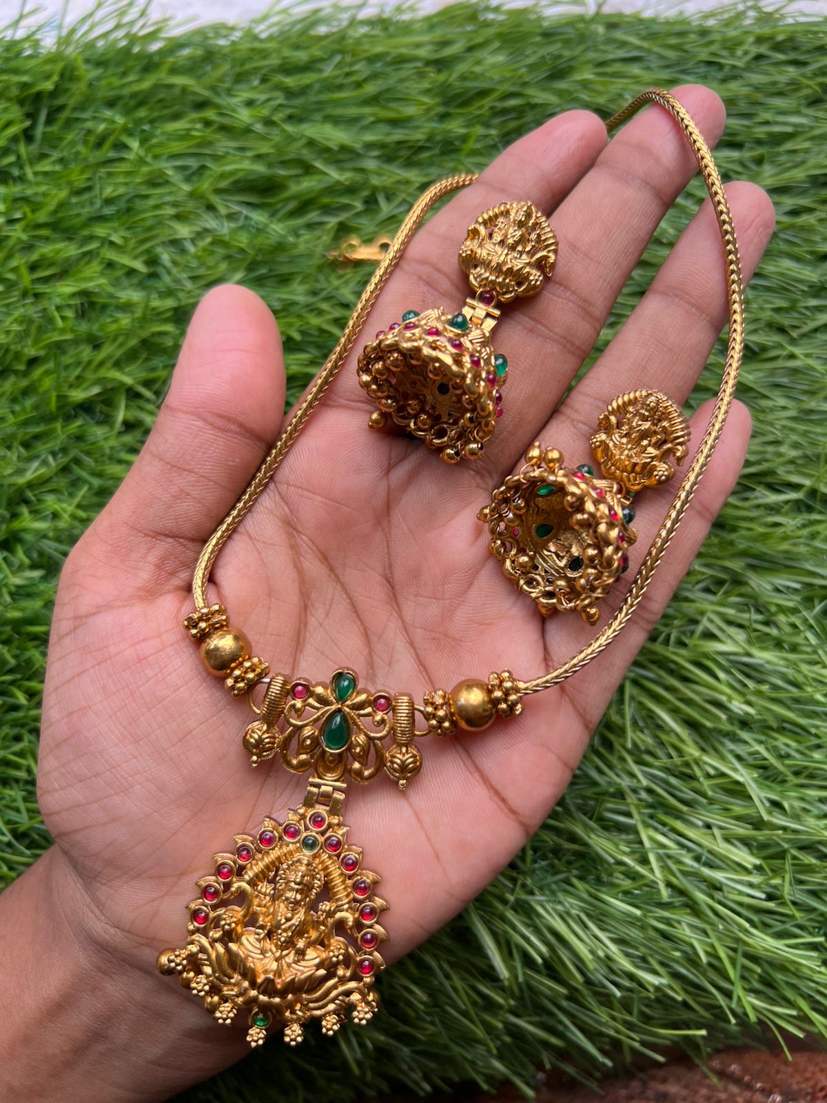 Pink ruby stone with lakshmi dollar gold neckpiece