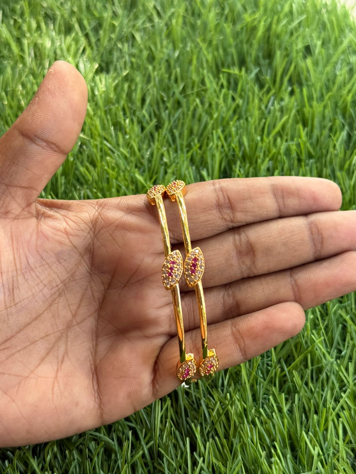 Eye design with unique design gold finish bangle