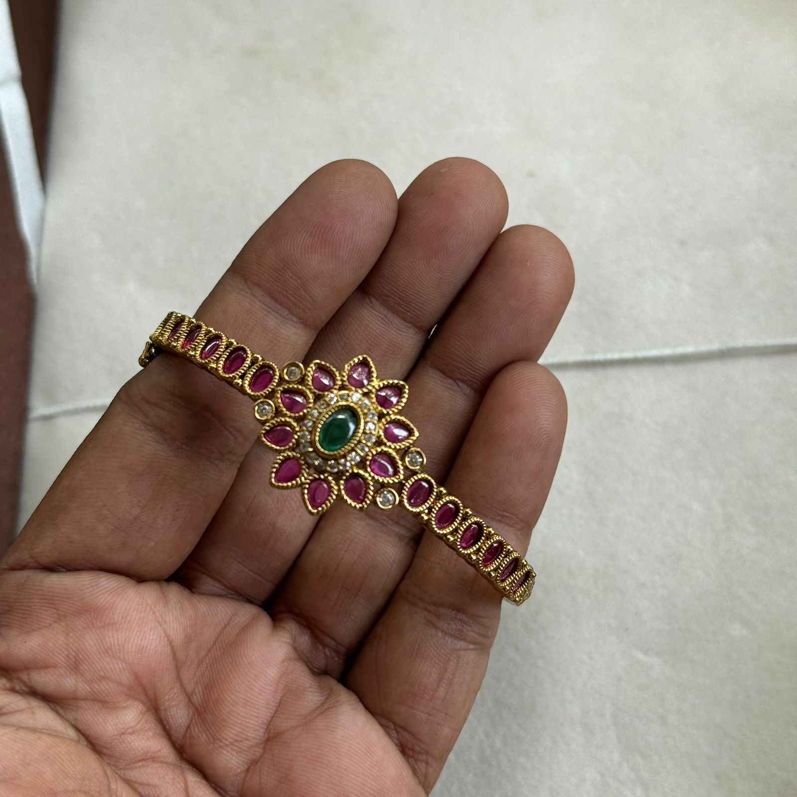 Gold bracelet with heart design