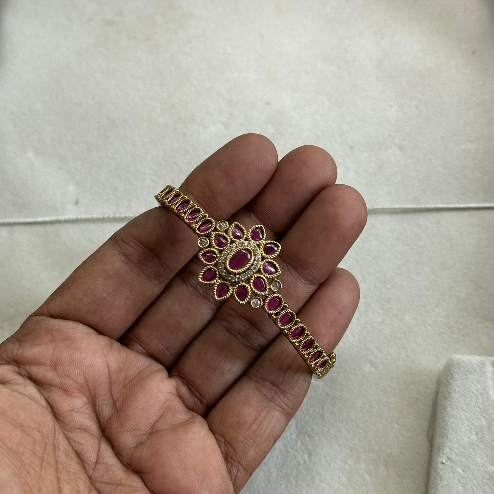 Gold bracelet with heart design