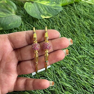 Flower design haram with green stone