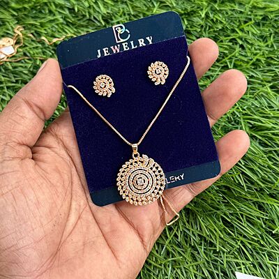 Rain drop design with white stone
