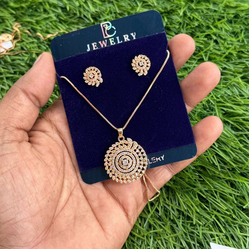 Rain drop design with white stone