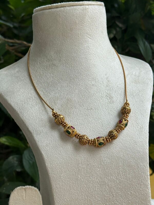 Lotus peatal design with green stone Lotus peatal design with green stone