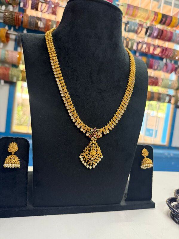 ONE GRAM GOLD FORMING DOLLAR CHAIN ONE GRAM GOLD FORMING DOLLAR CHAIN