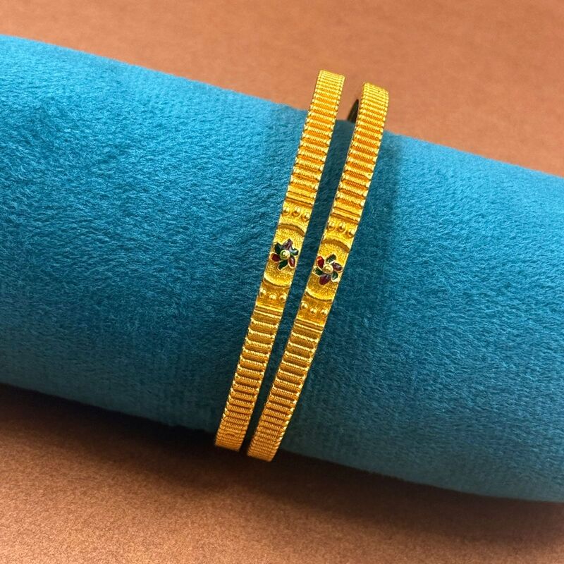 Antique round in flower design with Lakshmi Rubi stone Bangles Antique round in flower design with Lakshmi Rubi stone Bangles